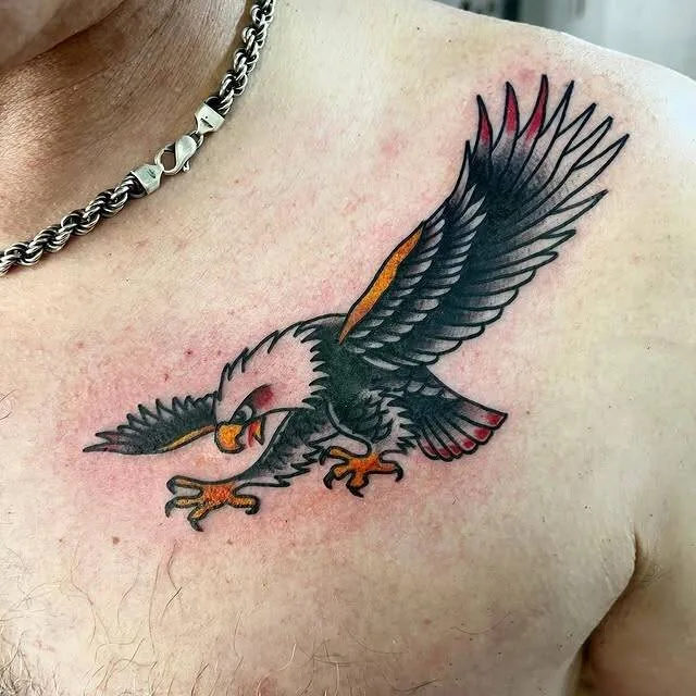 American Traditional bald eagle tattoo across the chest, wings spread and talons extended, by Forrest Goodrich at Ohana Tattoo, Waikiki, Hawaii.